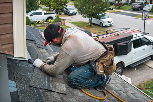 Professional Emergency Roof Repair technician working in Tully, NY